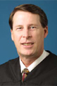 Commissioner R. Jeffrey WOODBURN